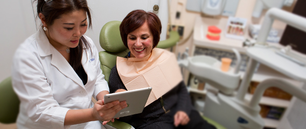 Dentist sharing results with patient